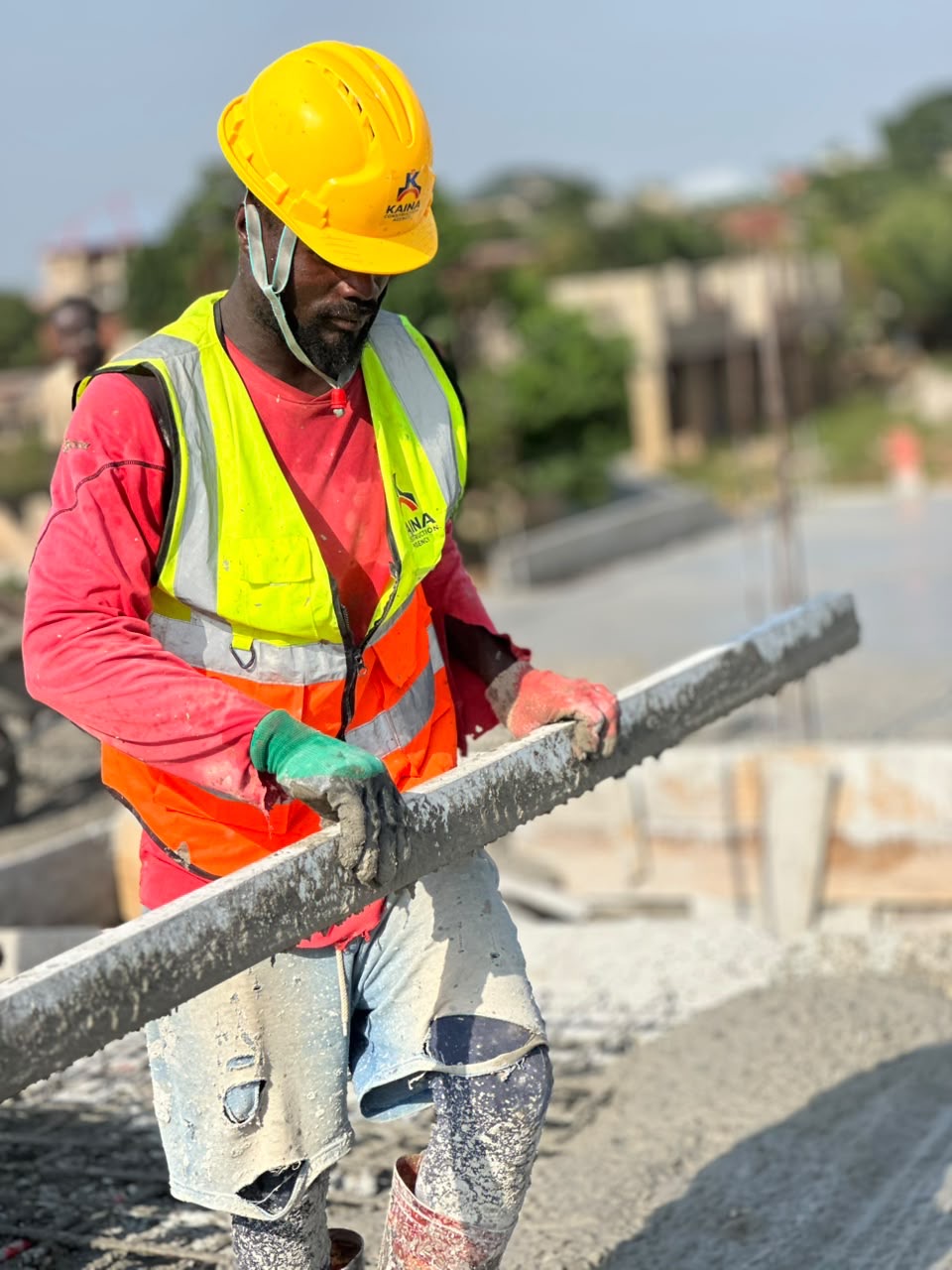 Kaina worker carrying out concrete work