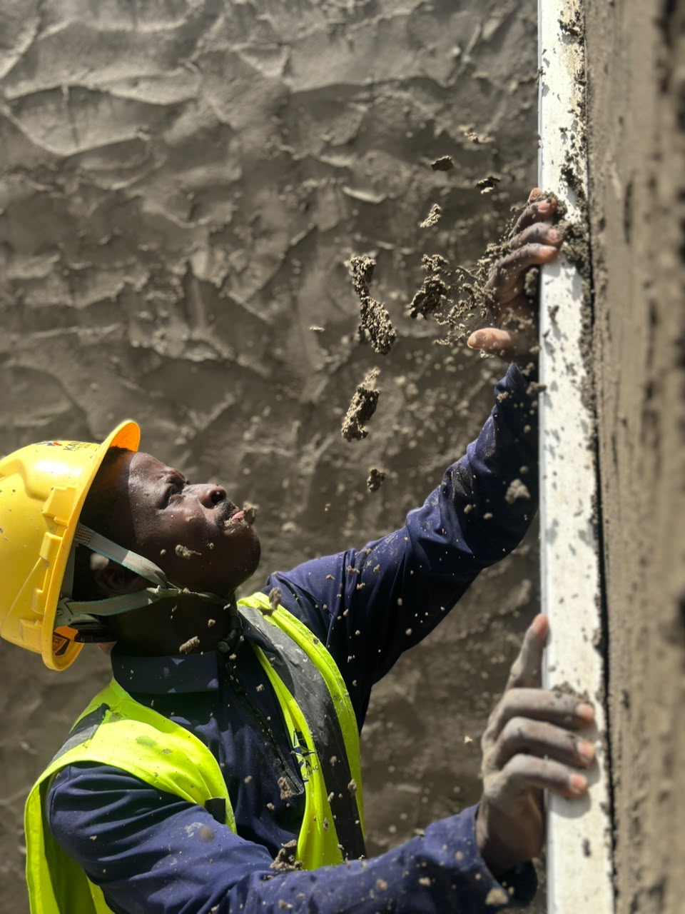 Kaina worker carrying out finishing work